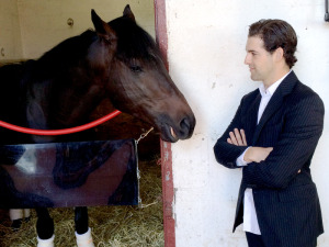 Racehorse Chase The Giant with trainer Ray Handal at Aqueduct racetrack, New York.